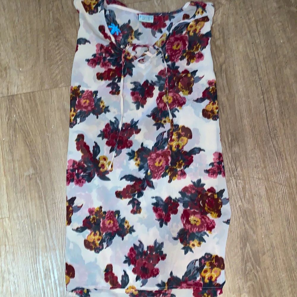 Sheer floral shirt. Half sleeve but it’s open and flowy great for spring summer!